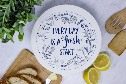 Washable medium bowl cover with fresh start print. Made of organic cotton.
