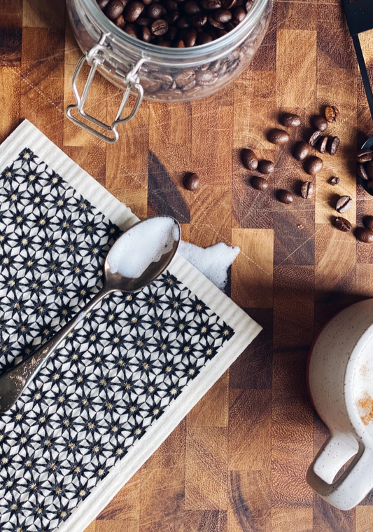 Eco-friendly sponge cloth in black starburst pattern, replace the use of up to 17 rolls of paper towel