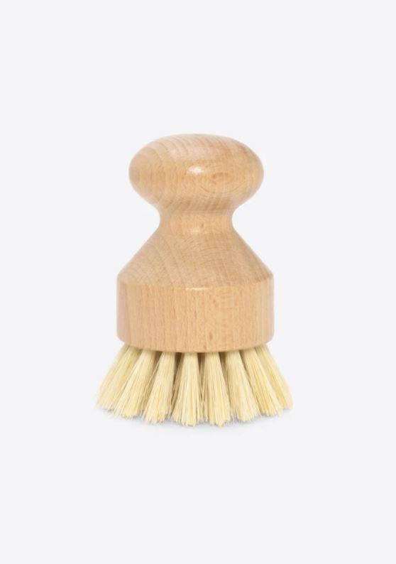natural dishwashing and vegetable scrub brush made with fiber bristles and a bamboo handle